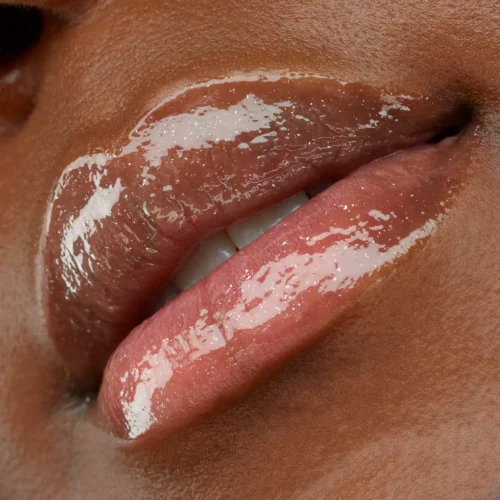 aplicat pe buze catrice Luciu pentru buze Better Than Fake Lips 060 - Shining Champagne